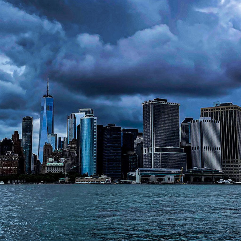 Storm clouds gather over America’s financial supremacy A dark and dreary New York City with ominous storm clouds