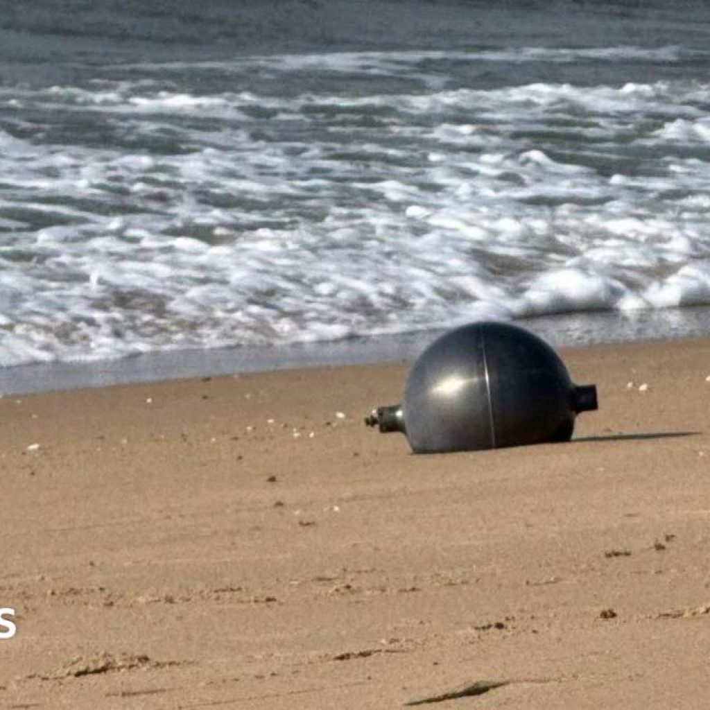 Australia probes mystery space balls that washed up on
beach