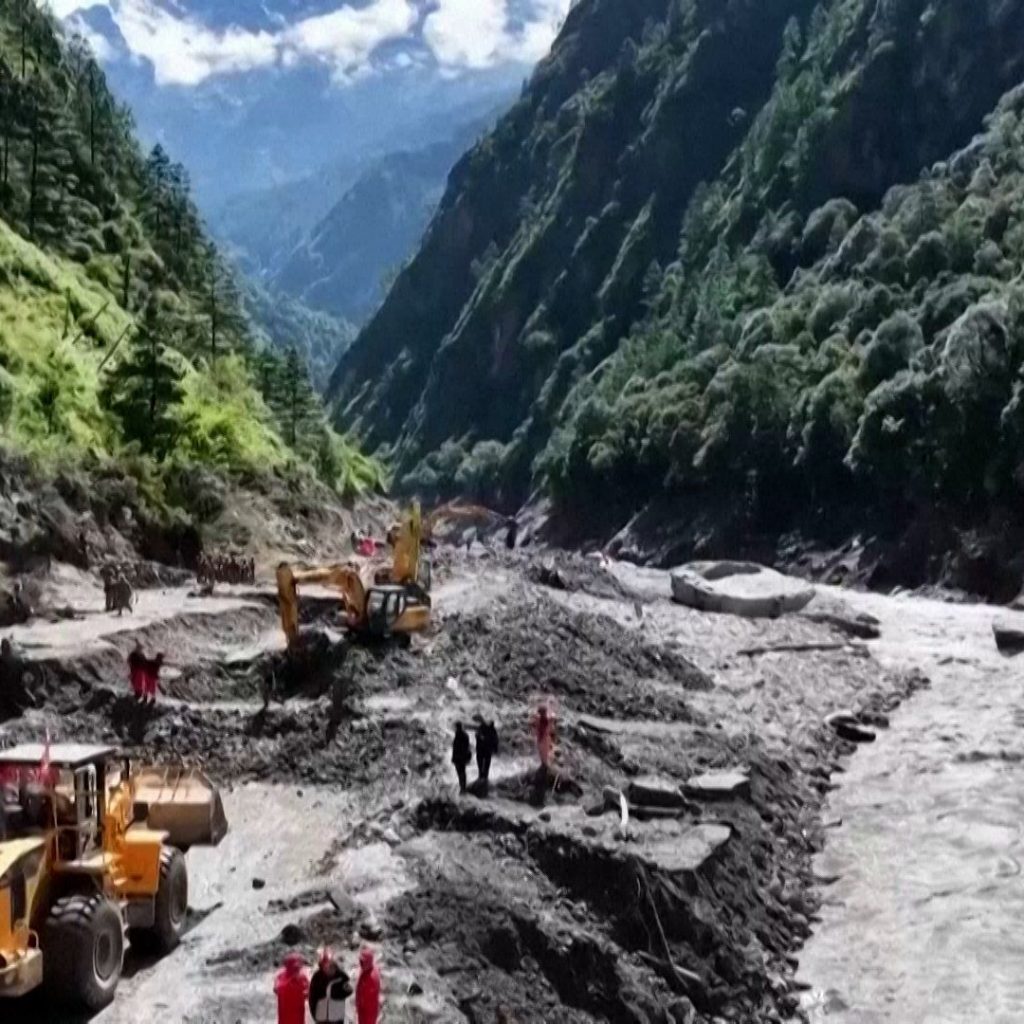 Chinese rescuers race to reach mudslide survivors in
Nepal-China border