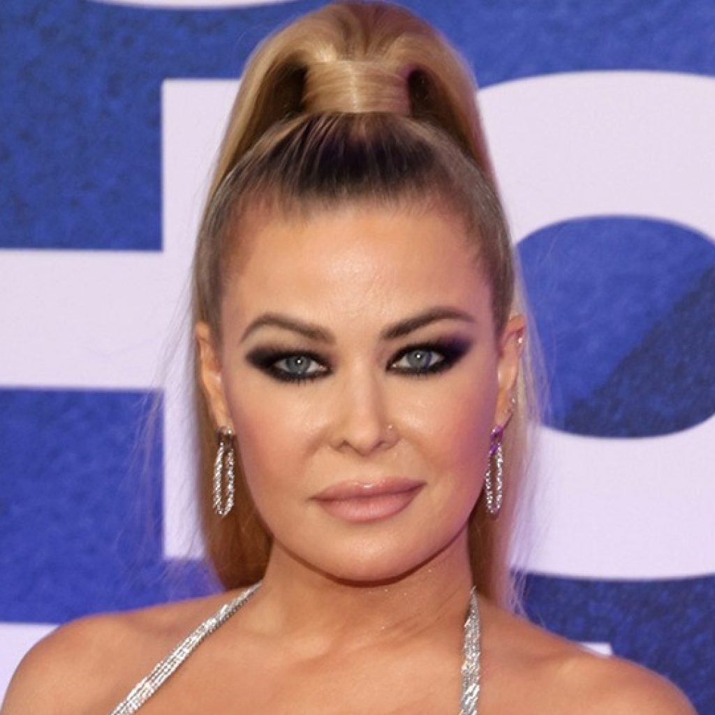Carmen Electra Poses Topless in Sultry Photos From Berlin
Trip