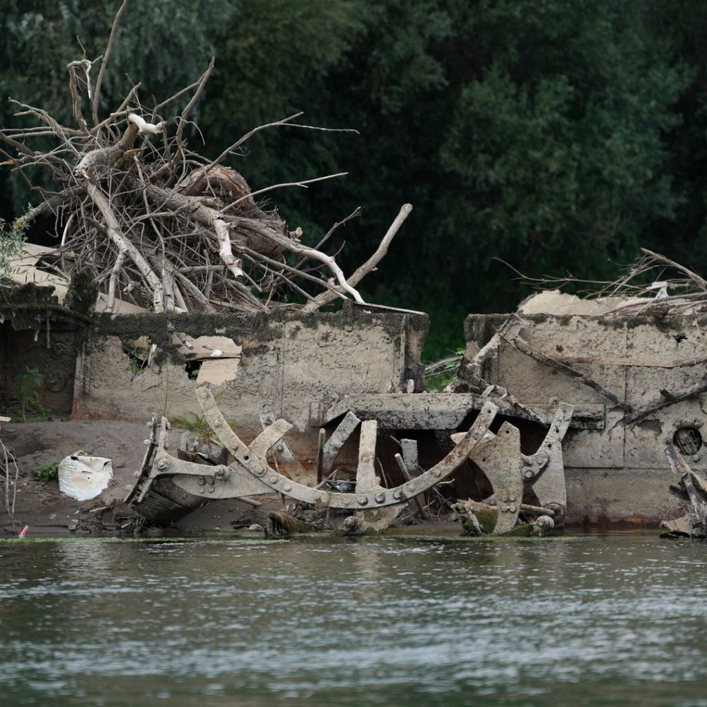 European drought reveals 100-year-old steam boat and ancient
Roman bridge