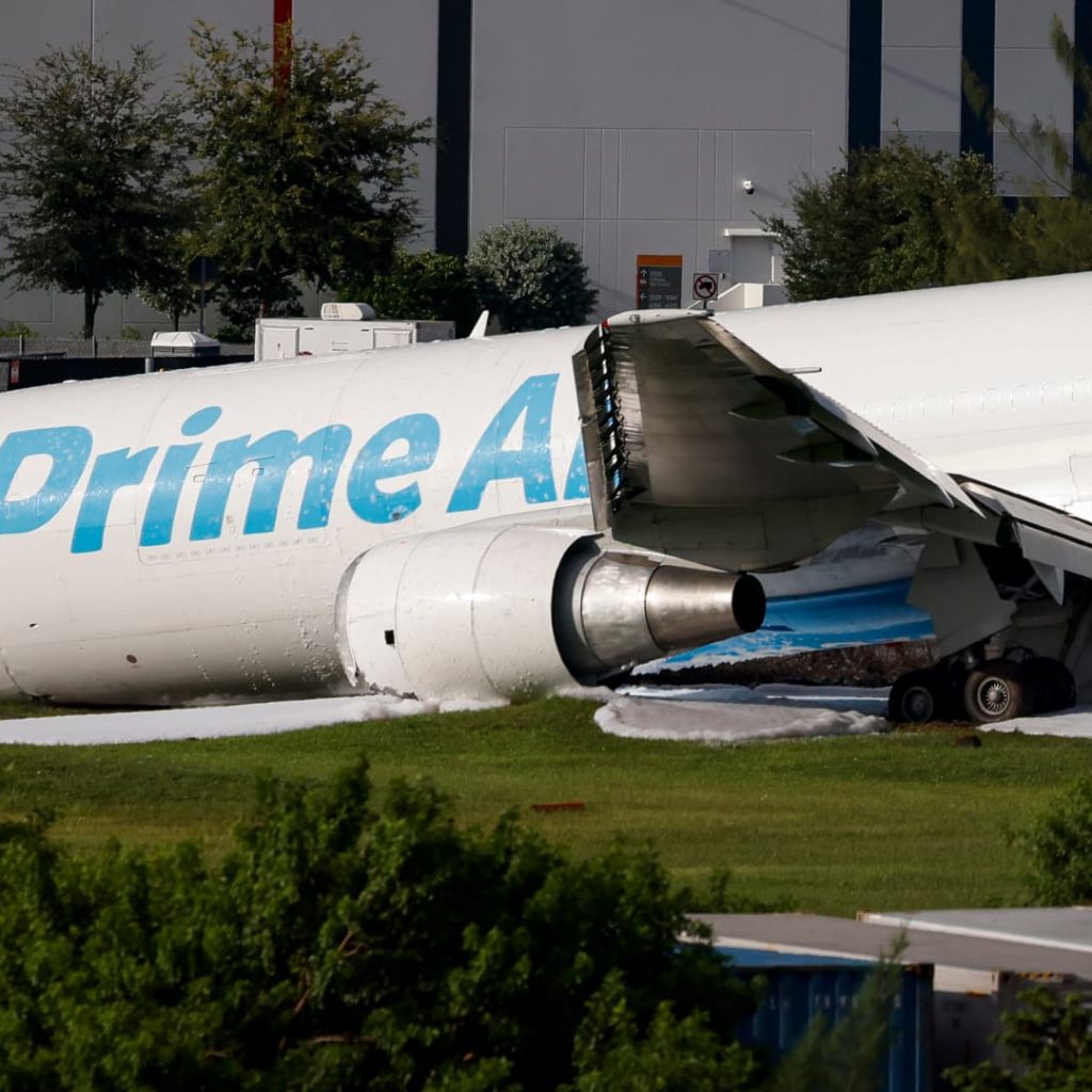 Crashed Amazon cargo jet struck two vehicles, ended up 1,300
feet past runway, NTSB says