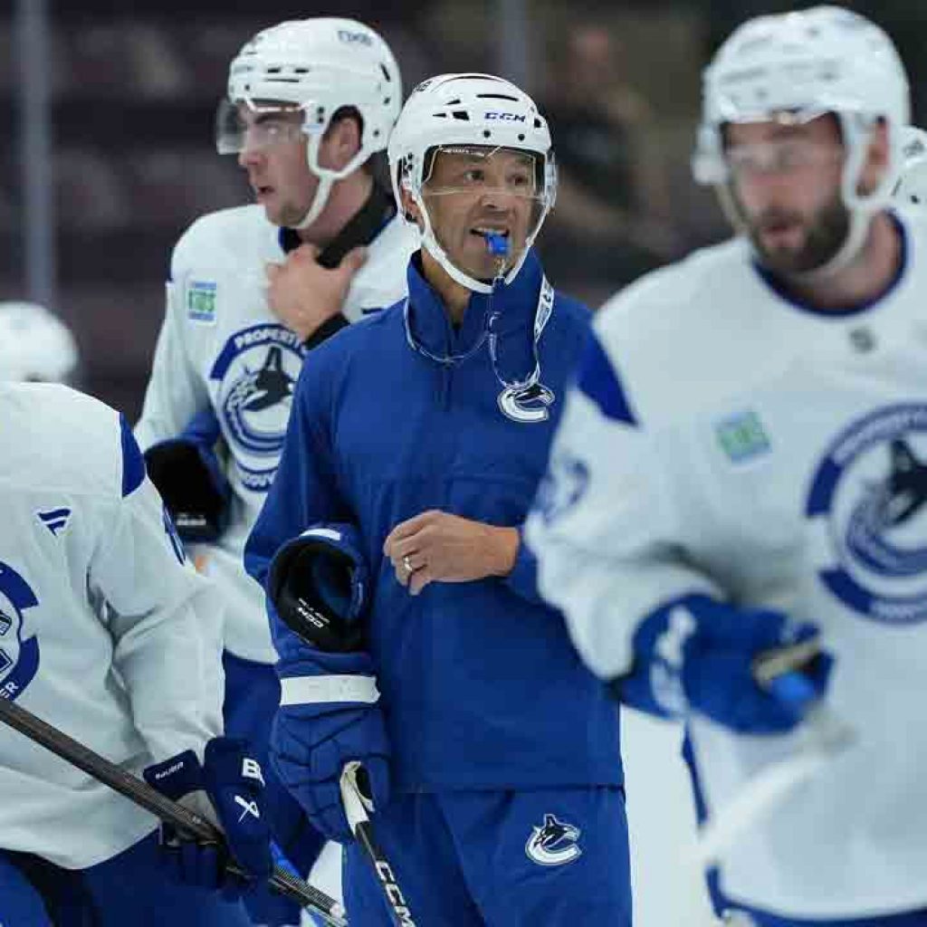 Canucks’ comeback win reinforces positivity built during
pre-season