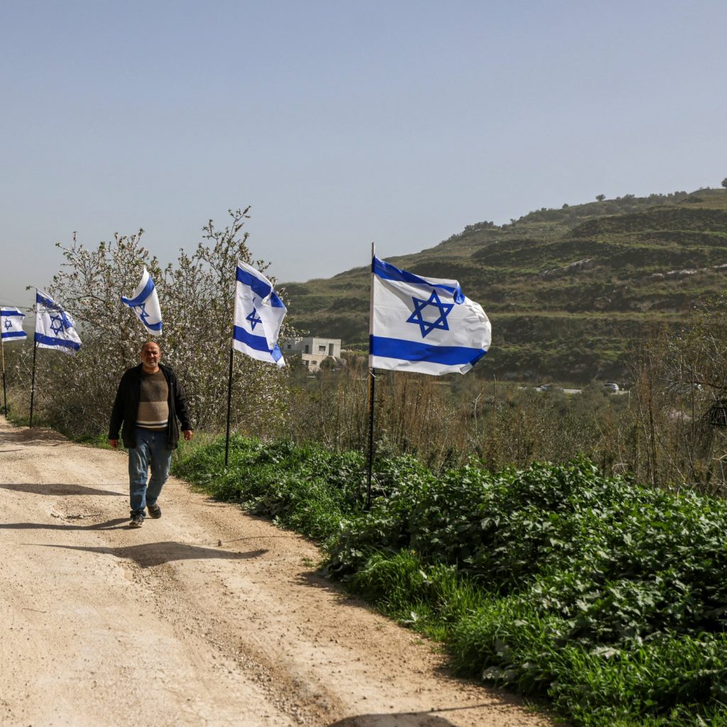 Israeli flags become the latest weapon of settlers in West
Bank domination
