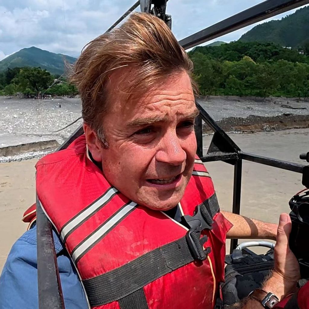Sky News crosses flooded Nepali river in high wire metal
cage