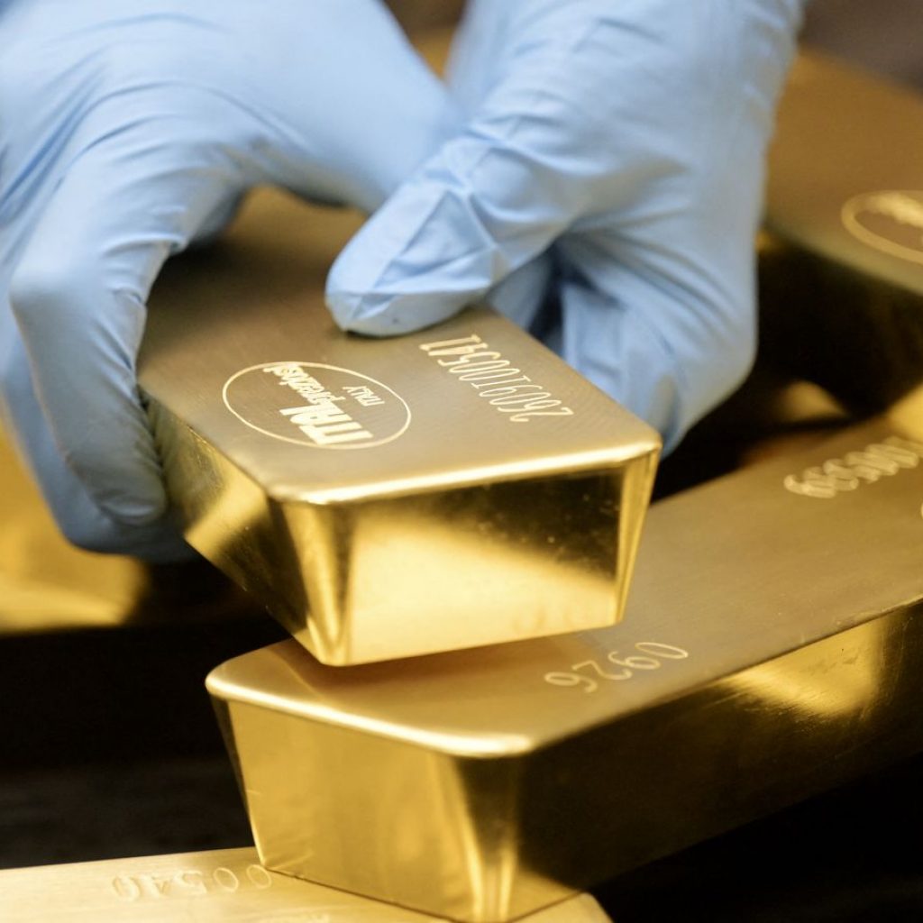 Gold wavers as traders weigh higher bond yields, oil at US$100