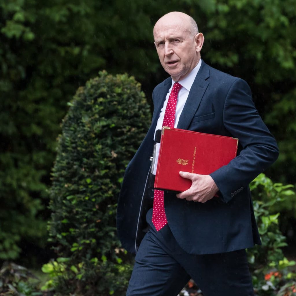 The UK cuts energy bills, taxes banks and boosts defense in
high-stakes budget