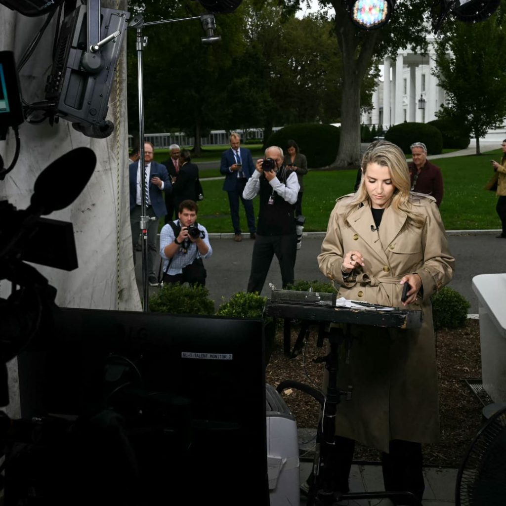 Justice Department opens antitrust probe as White House
press-access fight escalates