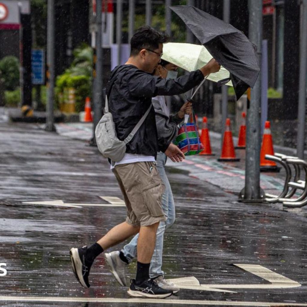Hundreds of flights cancelled as Typhoon Champi shuts
Taiwan