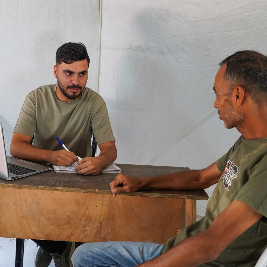 When streets become a workplace: Gaza workers convert tents
into offices