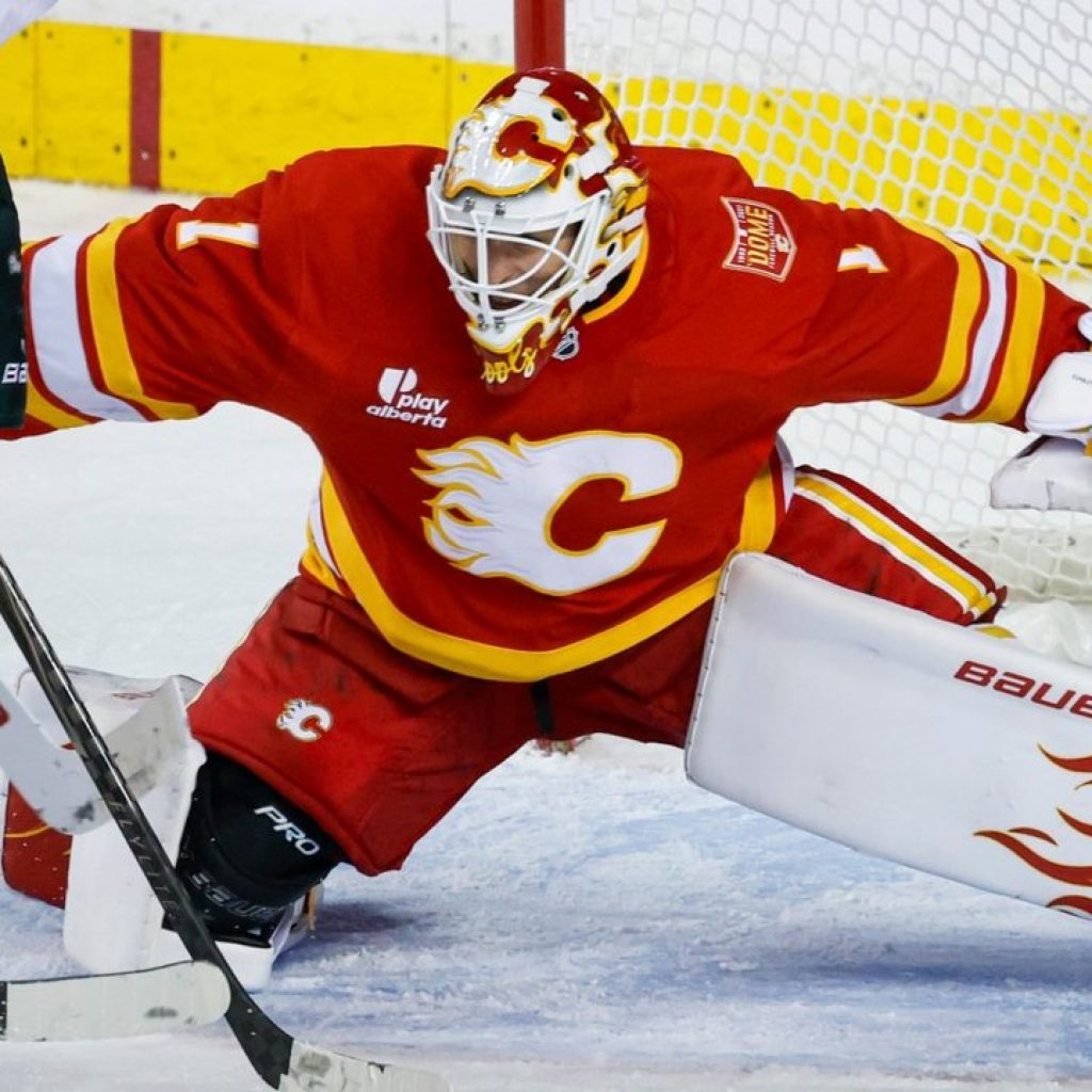 Flames’ Huska: Cooley’s play ‘making it hard’ to switch
goalies
