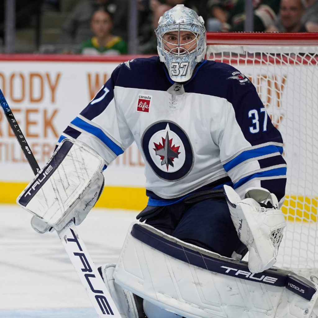 Hellebuyck embraces fresh start with Devils, postpones
message to Jets fans