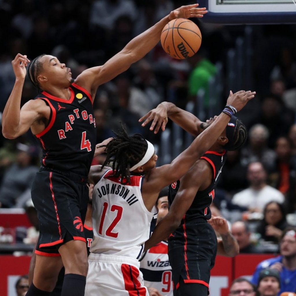 Raptors play bigger than their size to overcome towering
Wizards