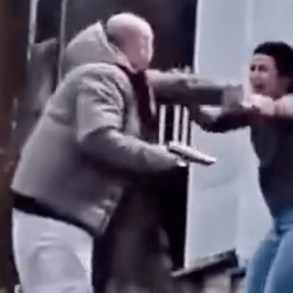 Man with fake gun shot after using abused partner as
shield