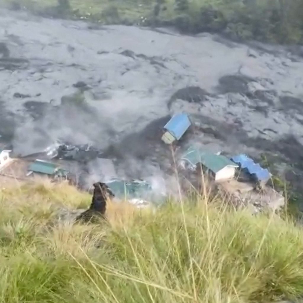 At least five people missing as flash floods in Nepal sweep
away houses