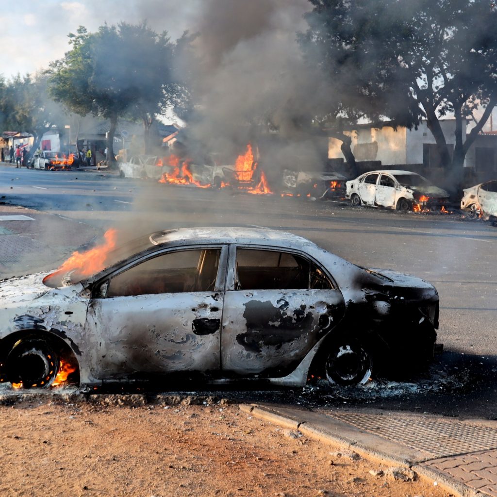 South Africa protests turn violent amid rage over asylum
ruling