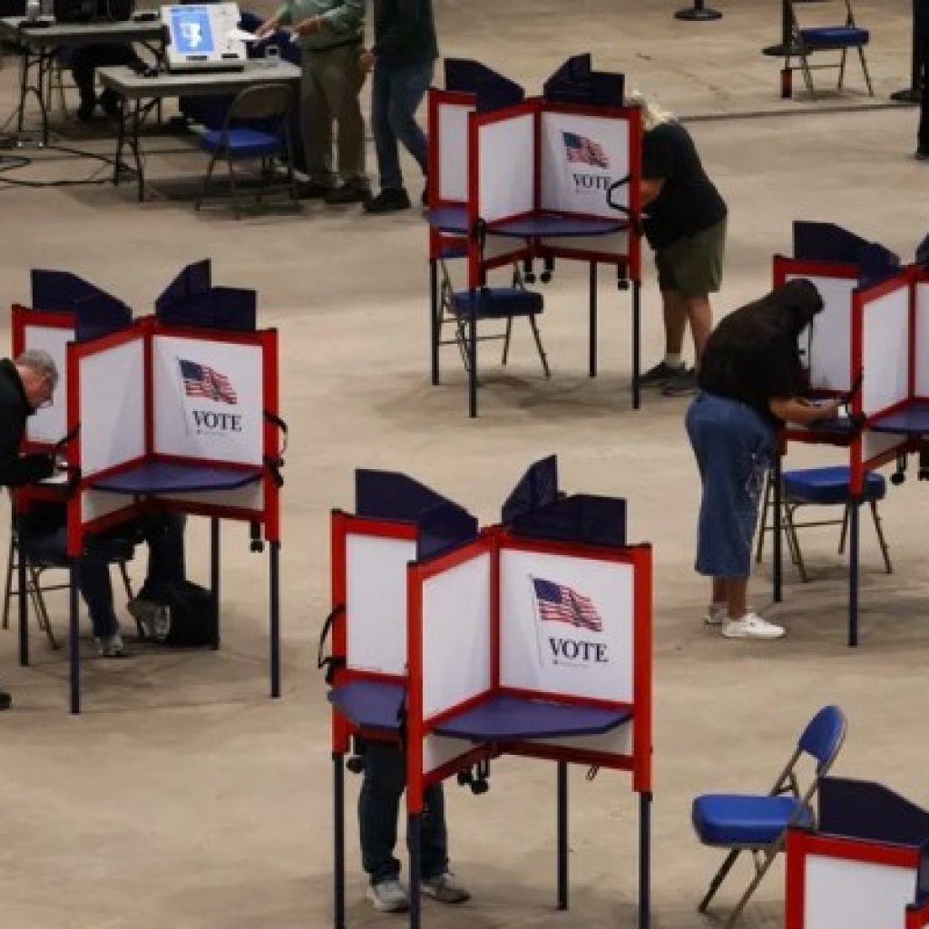 Election officials brace for federal interference but expect
to persevere