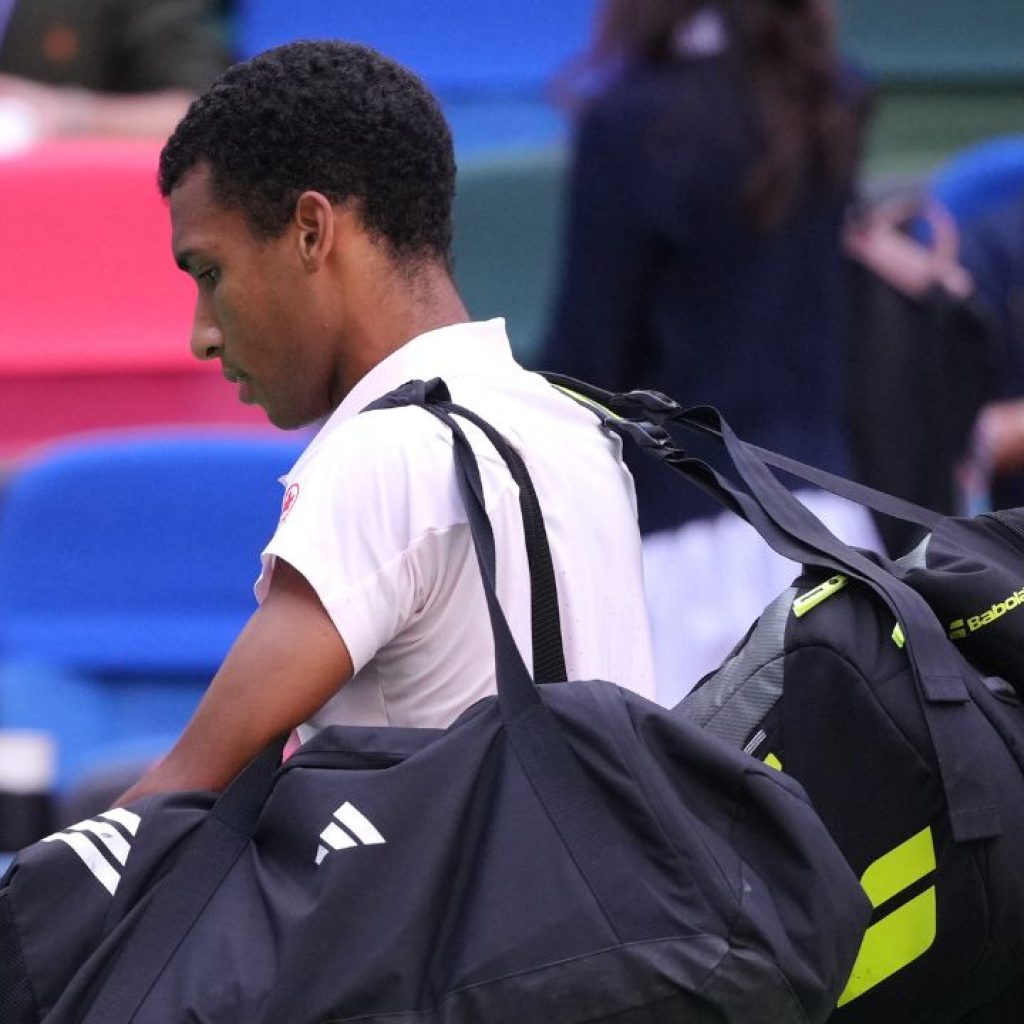 Canada’s Felix Auger-Aliassime retires with knee injury vs.
Ruud in Shanghai