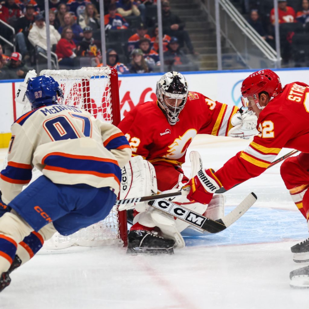Flames’ Wolf gets feet wet again to mixed results after
Cooley injury