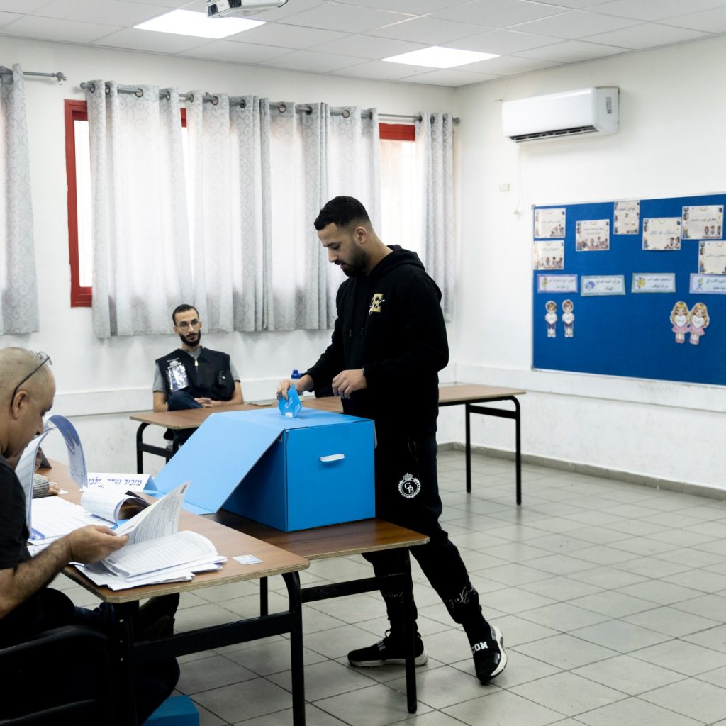 Arab parties could win record 18 seats in Israel election,
exit polls show