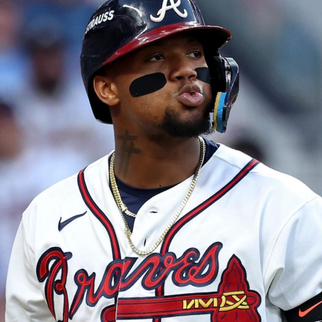 Braves fail to find magic touch as Postseason run ends in
scuffling fashion for bats