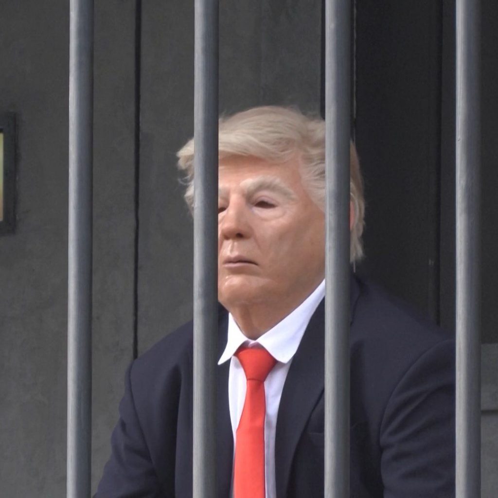 Tehran displays mock installation of Trump behind
bars