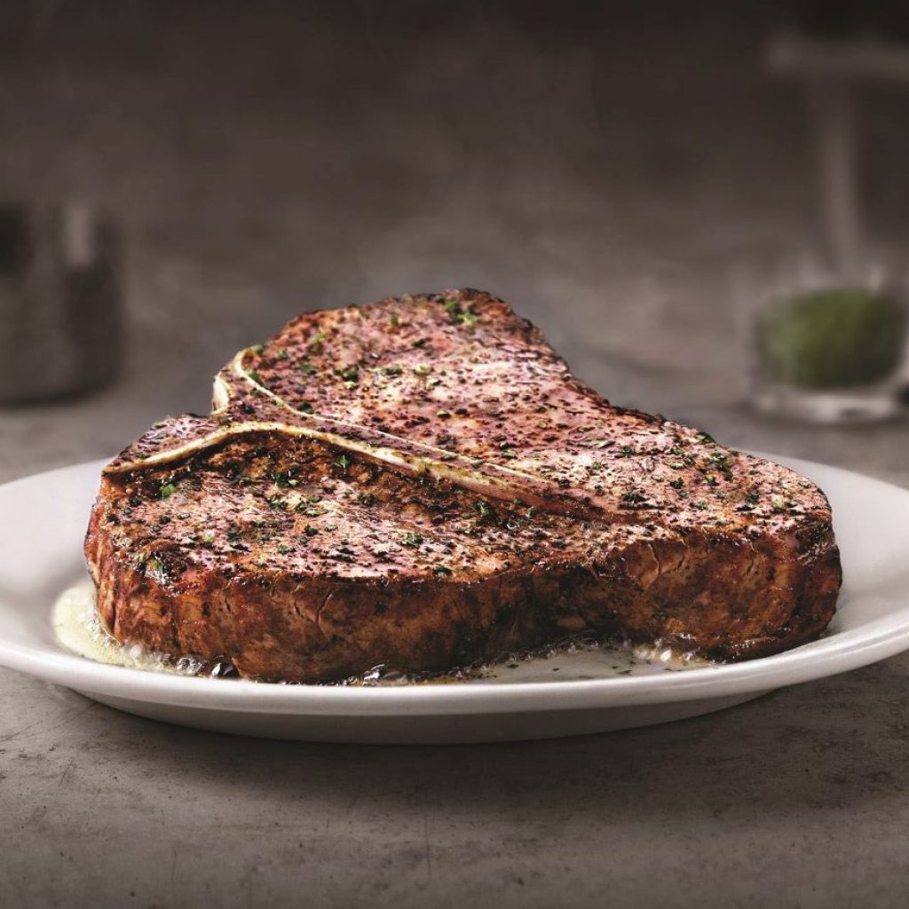 5 Steakhouse Chains With the Best T-Bone Steak and Loaded Baked Potato, According to Diners