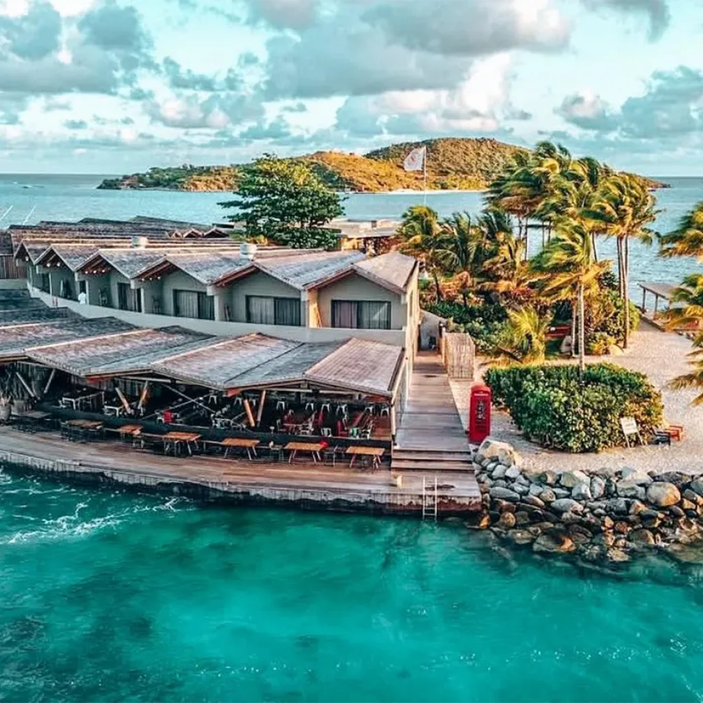 This Tiny Caribbean Island Resort Has a Waterfront Bar,
Oceanview Rooms and Some of the World’s Best Kitesurfing
